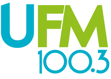 Logo with 'UFM 100.3' text in blue and green on a white background